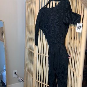 Vintage 80’s jumpsuit with deep v back